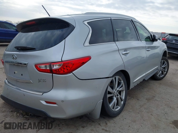 2013 Infiniti JX35 with VIN 5N1AL0MM8DC352896, listed as a IAAI auction lot 41561639 with 158,533 mi miles and . Bid and sale history available at DreamBid. Image 4.