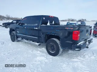 2015 Chevrolet Silverado 1500 High Country with VIN 3GCUKTEC0FG148198, listed as a IAAI auction lot 41493933 with 164,453 mi miles and . Bid and sale history available at DreamBid. Image 3.