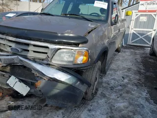 2003 Ford F-150 XL with VIN 2FTRX18W73CB07559, listed as a IAAI auction lot 41452402 with 152,509 mi miles. Bid and sale history available at carsss.com. Image 12.