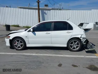 2005 Mitsubishi Lancer Evolution VIII with VIN JA3AH86DX5U054278, listed as a IAAI auction lot 41881180 with 157,497 mi miles. Bid and sale history available at carsss.com. Image 14.