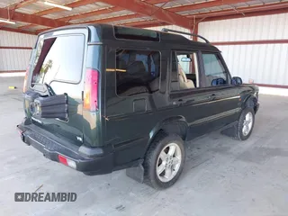 2003 Land Rover Discovery SE z VIN SALTW16413A785633, wystawiony jako IAAI lot #42196601 z przebiegiem 128 864 mil mil oraz . Historia ofert i sprzedaży dostępna na DreamBid. Obrazek 4.