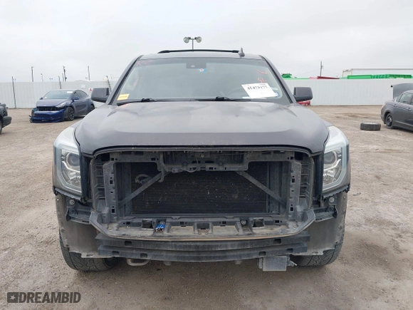 2016 GMC Yukon XL Denali with VIN 1GKS1HKJ7GR186012, listed as a IAAI auction lot 41473177 with 156,280 mi miles. Bid and sale history available at carsss.com. Image 13.