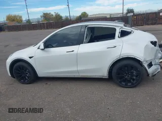 2021 Tesla Model Y Long Range with VIN 5YJYGDEE2MF074246, listed as a IAAI auction lot 40456971 with 94,527 mi miles. Bid and sale history available at carsss.com. Image 14.