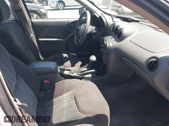 2004 Pontiac Grand Am SE1 z VIN 1G2NF52E34C251629, wystawiony jako IAAI lot #42257619 z przebiegiem 161 765 mil mil oraz . Historia ofert i sprzedaży dostępna na DreamBid. Obrazek 5.