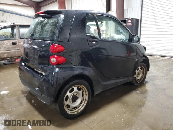 2012 Smart fortwo Pure z VIN WMEEJ3BA3CK570191, wystawiony jako Copart lot #43576165 z przebiegiem 80 511 mil mil oraz Szkody całkowita. Historia ofert i sprzedaży dostępna na DreamBid. Obrazek 3.