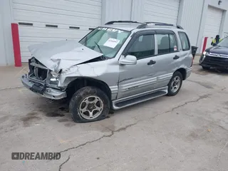 2001 Chevrolet Tracker LT z VIN 2CNBJ634916959876, wystawiony jako IAAI lot #42166992 z przebiegiem 97 878 mil mil oraz . Historia ofert i sprzedaży dostępna na DreamBid. Obrazek 2.