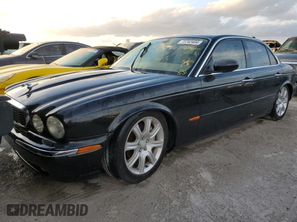 2004 Jaguar XJ with VIN SAJWA71C04SG31354, listed as a Copart auction lot 73742404 with 0 mi miles and Non Repairable. Bid and sale history available at carsss.com. Image 5.