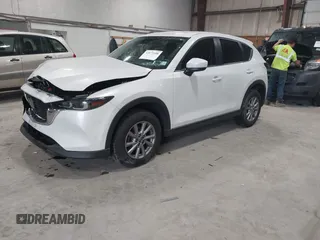 2023 Mazda CX-5 2.5 S with VIN JM3KFBAMXP0153362, listed as a IAAI auction lot 41875188 with 57,648 mi miles. Bid and sale history available at carsss.com. Image 17.