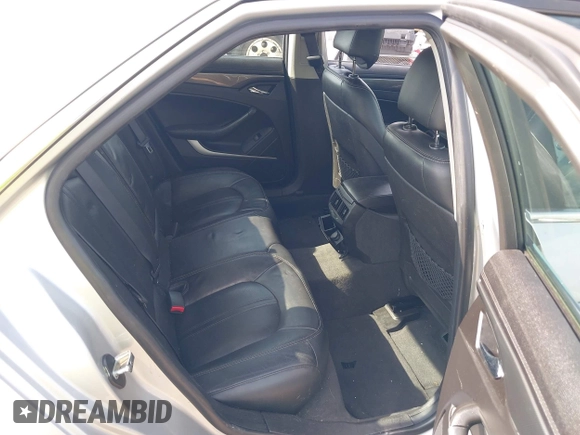 2012 Cadillac CTS Performance z VIN 1G6DJ5E37C0145221, wystawiony jako IAAI lot #42111935 z przebiegiem 82 103 mil mil oraz . Historia ofert i sprzedaży dostępna na DreamBid. Obrazek 8.