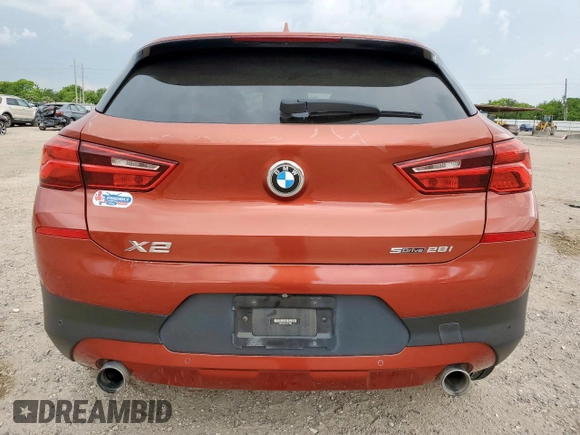 2018 BMW X2 sDrive28i with VIN WBXYJ3C37JEJ75893, listed as a Copart auction lot 62513565 with 62,029 mi miles and Salvage title. Bid and sale history available at DreamBid. Image 6.