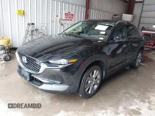 2023 Mazda CX-30 S Premium z VIN 3MVDMBDM5PM589289, wystawiony jako IAAI lot #41331253 z przebiegiem 24 804 mil mil oraz . Historia ofert i sprzedaży dostępna na DreamBid. Obrazek 17.
