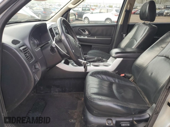 2005 Mercury Mariner Luxury with VIN 4M2YU57115DJ23819, listed as a Copart auction lot 54370265 with 215,657 mi miles and Clean title. Bid and sale history available at DreamBid. Image 7.
