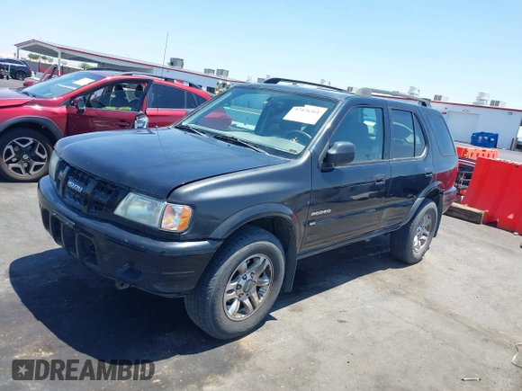 2004 Isuzu Rodeo S с VIN 4S2CK58YX44311680, выставлен на аукционе IAAI как лот 42476361 с пробегом 154 693 миль миль и . История ставок и продаж доступна на DreamBid. Изображение 6.
