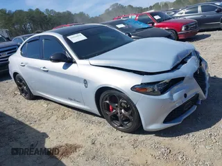 2021 Alfa Romeo Giulia Ti Sport with VIN ZARFAMBN1M7641345, listed as a IAAI auction lot 41856804 with 55,138 mi miles and . Bid and sale history available at DreamBid. Image 1.