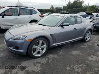 2004 Mazda RX-8 with VIN JM1FE17N740117681, listed as a Copart auction lot 85284094 with 138,555 mi miles and Salvage Title. Bid and sale history available at carsss.com. Image 1.