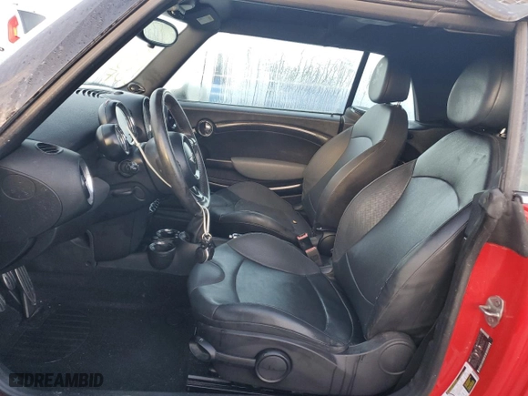 2011 MINI Cooper Convertible s with VIN WMWZP3C57BTX84235, listed as a Copart auction lot 76177014 with 52,947 mi miles and Non Repairable. Bid and sale history available at carsss.com. Image 7.