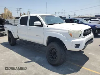 2014 Toyota Tacoma PreRunner with VIN 3TMKU4HN8EM041212, listed as a Copart auction lot 61948125 with 83,601 mi miles and Salvage title. Bid and sale history available at DreamBid. Image 4.