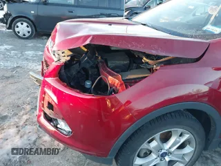 2015 Ford Escape Titanium with VIN 1FMCU9J99FUB34831, listed as a IAAI auction lot 41278305 with 59,658 mi miles and . Bid and sale history available at DreamBid. Image 18.