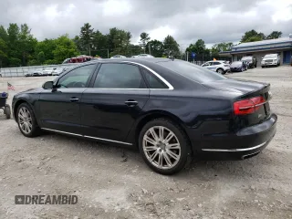 2015 Audi A8 4.0T with VIN WAU32AFD6FN013982, listed as a Copart auction lot 58122294 with 100,981 mi miles and Clean title. Bid and sale history available at DreamBid. Image 2.