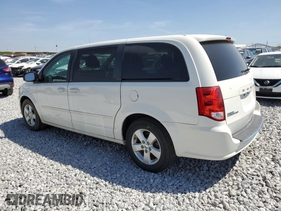 2013 Dodge Grand Caravan SE with VIN 2C4RDGBG9DR772944, listed as a Copart auction lot 56014894 with 193,635 mi miles and Salvage Title. Bid and sale history available at DreamBid. Image 2.