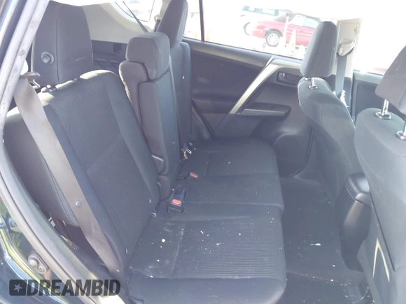 2018 Toyota RAV4 LE with VIN JTMZFREV1JJ203943, listed as a IAAI auction lot 41921863 with 104,691 mi miles. Bid and sale history available at carsss.com. Image 8.