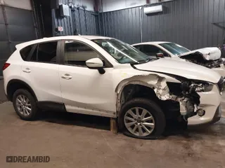 2015 Mazda CX-5 Touring with VIN JM3KE4CY4F0509530, listed as a IAAI auction lot 41858134 with 102,360 mi miles. Bid and sale history available at carsss.com. Image 13.