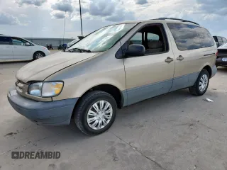 2000 Toyota Sienna LE with VIN 4T3ZF13C2YU218417, listed as a Copart auction lot 63328035 with 263,439 mi miles and Salvage title. Bid and sale history available at DreamBid. Image 1.