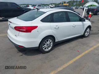 2015 Ford Focus SE with VIN 1FADP3F28FL204145, listed as a IAAI auction lot 42107720 with 129,441 mi miles and . Bid and sale history available at DreamBid. Image 4.