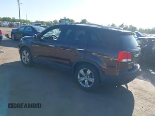 2012 Kia Sorento EX with VIN 5XYKUDA23CG206609, listed as a IAAI auction lot 42142072 with 162,574 mi miles. Bid and sale history available at carsss.com. Image 3.