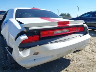 2013 Dodge Challenger SXT with VIN 2C3CDYAG6DH737253, listed as a IAAI auction lot 40615411 with 133,973 mi miles. Bid and sale history available at carsss.com. Image 6.