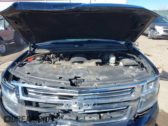 2018 Chevrolet Suburban Premier z VIN 1GNSCJKC5JR386545, wystawiony jako IAAI lot #41684349 z przebiegiem 130 511 mil mil oraz . Historia ofert i sprzedaży dostępna na DreamBid. Obrazek 10.