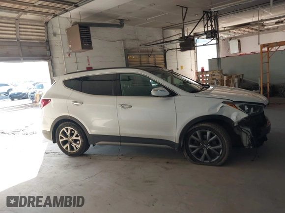 2017 Hyundai Santa Fe Ultimate with VIN 5XYZWDLA2HG491338, listed as a IAAI auction lot 42590671 with 114,521 mi miles and . Bid and sale history available at DreamBid. Image 14.