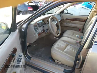 2004 Mercury Grand Marquis GS with VIN 2MEFM74WX4X696703, listed as a IAAI auction lot 42171970 with 149,556 mi miles and . Bid and sale history available at DreamBid. Image 5.