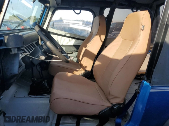 1992 Jeep Wrangler z VIN 2J4FY19P6NJ559597, wystawiony jako Copart lot #74990384 z przebiegiem 150 298 mil mil oraz Szkoda całkowita • Salvage title. Historia ofert i sprzedaży dostępna na DreamBid. Obrazek 7.