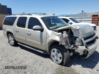 2013 Chevrolet Suburban LT with VIN 1GNSCJE06DR140058, listed as a Copart auction lot 56317995 with 124,345 mi miles and Salvage title. Bid and sale history available at DreamBid. Image 4.