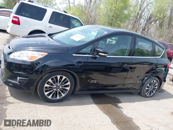 2017 Ford C-Max Energi Titanium with VIN 1FADP5FU2HL115199, listed as a IAAI auction lot 42001944 with 57,609 mi miles. Bid and sale history available at carsss.com. Image 14.