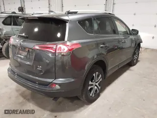 2018 Toyota RAV4 LE with VIN JTMBFREV8JJ243177, listed as a IAAI auction lot 41830598 with 64,231 mi miles. Bid and sale history available at carsss.com. Image 4.
