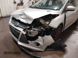 2012 Ford Focus SE with VIN 1FAHP3F21CL284921, listed as a IAAI auction lot 42054351 with 164,377 mi miles and . Bid and sale history available at carsss.com. Image 6.