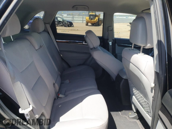 2014 Kia Sorento LX z VIN 5XYKT4A74EG461352, wystawiony jako Copart lot #53847275 z przebiegiem 100 700 mil mil oraz Szkoda całkowita • Salvage title. Historia ofert i sprzedaży dostępna na DreamBid. Obrazek 11.