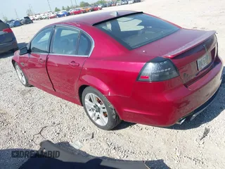 2009 Pontiac G8 z VIN 6G2ER57799L170338, wystawiony jako IAAI lot #42088706 z przebiegiem 157 582 mil mil oraz . Historia ofert i sprzedaży dostępna na DreamBid. Obrazek 3.