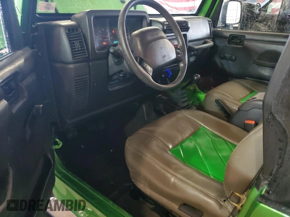 2002 Jeep Wrangler Sport with VIN 1J4FA49S72P701075, listed as a Copart auction lot 66894914 with 169,971 mi miles and Salvage Title. Bid and sale history available at carsss.com. Image 8.