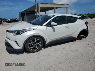 2018 Toyota C-HR XLE z VIN JTNKHMBX3J1006739, wystawiony jako Copart lot #59875715 z przebiegiem 126 204 mil mil oraz Szkoda całkowita • Salvage title. Historia ofert i sprzedaży dostępna na DreamBid. Obrazek 1.