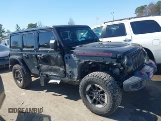 2019 Jeep Wrangler Unlimited Rubicon with VIN 1C4HJXFN1KW679028, listed as a IAAI auction lot 41654887 with 32,247 mi miles and . Bid and sale history available at DreamBid. Image 13.