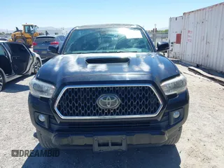 2018 Toyota Tacoma SR5 with VIN 3TMBZ5DN1JM014540, listed as a IAAI auction lot 42505324 with 112,990 mi miles and . Bid and sale history available at DreamBid. Image 12.