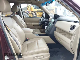 2009 Honda Pilot Touring with VIN 5FNYF48959B007813, listed as a IAAI auction lot 41823645 with 200,571 mi miles and . Bid and sale history available at carsss.com. Image 5.