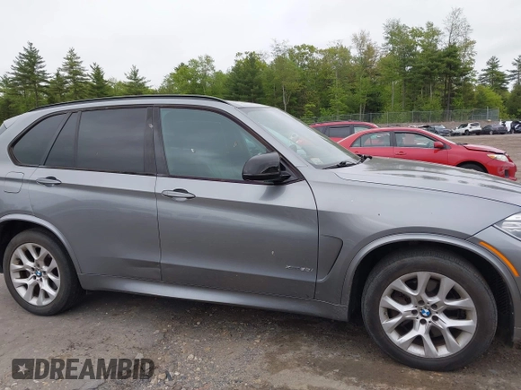 2014 BMW X5 xDrive50i with VIN 5UXKR6C54E0C02423, listed as a IAAI auction lot 42278044 with 122,370 mi miles and . Bid and sale history available at DreamBid. Image 13.