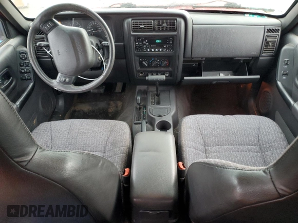 2000 Jeep Cherokee Police with VIN 1J4FF48S3YL110082, listed as a Copart auction lot 87213104 with 145,486 mi miles and Clean Title. Bid and sale history available at carsss.com. Image 8.