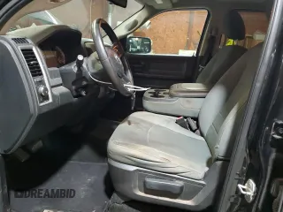 2015 Ram 1500 Express with VIN 1C6RR7KT3FS584959, listed as a Copart auction lot 60446585 with 144,867 mi miles and Salvage title. Bid and sale history available at DreamBid. Image 7.