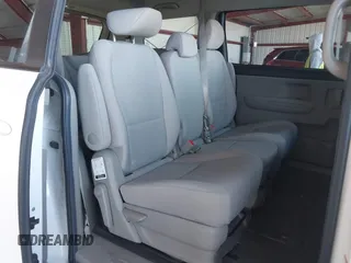 2021 Kia Sedona LX with VIN KNDMB5C15M6669588, listed as a IAAI auction lot 41757129 with 14,738 mi miles. Bid and sale history available at carsss.com. Image 8.