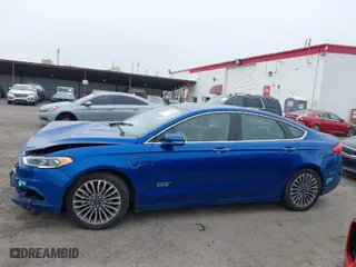 2017 Ford Fusion Energi Titanium with VIN 3FA6P0SU5HR229670, listed as a IAAI auction lot 41594048 with 117,848 mi miles. Bid and sale history available at carsss.com. Image 14.